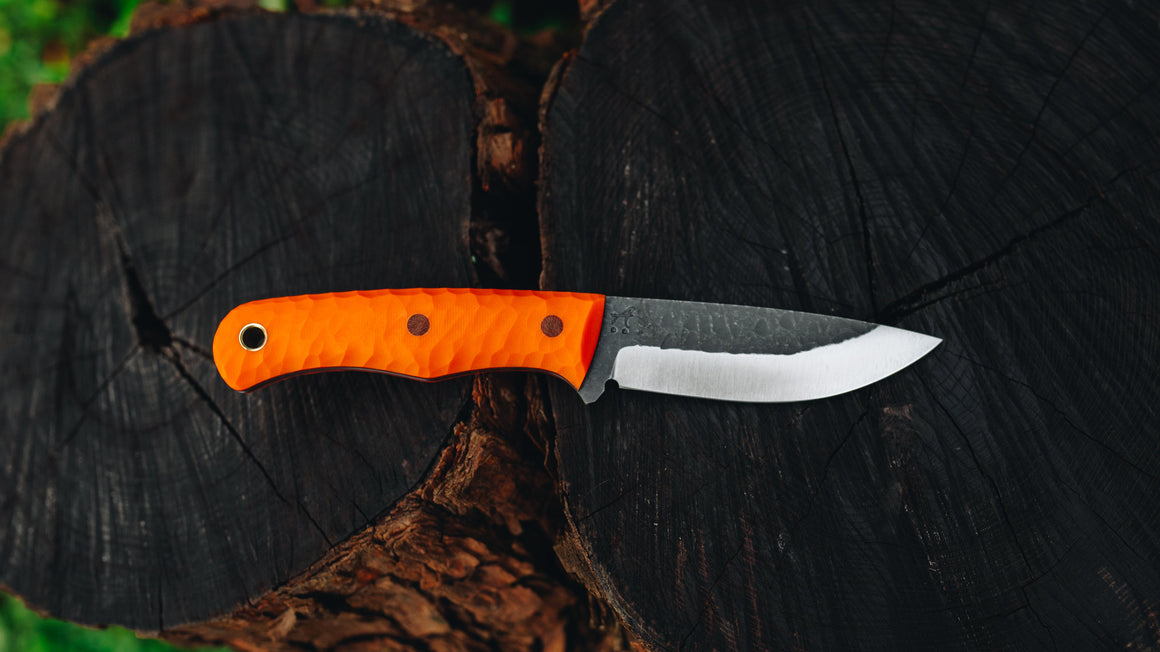 Badger - in textured orange G-10 - (CPM 154)
